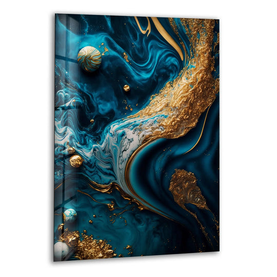 Abstract glass wall art showcasing a dramatic transition from deep navy blue to swirling teal and vibrant gold fluid art.