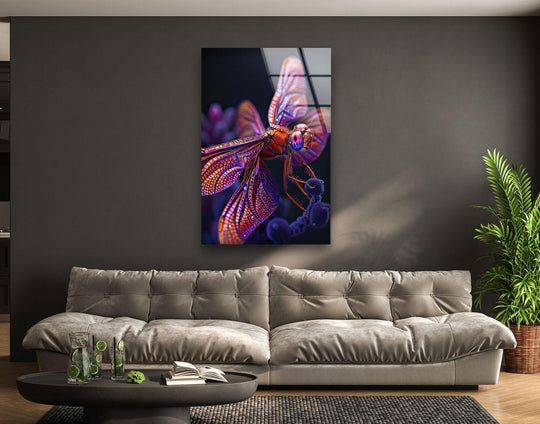 Vibrant pink and orange dragonfly wall art prints pop against the dark, moody background, creating a striking color contrast.