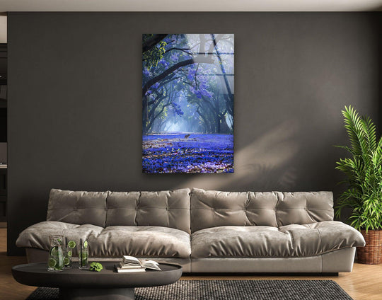 Darkest areas highlight the depth and luminosity of this enchanted jacaranda path glass print wall art, capturing a dreamlike floral escape with breathtaking purple hues.