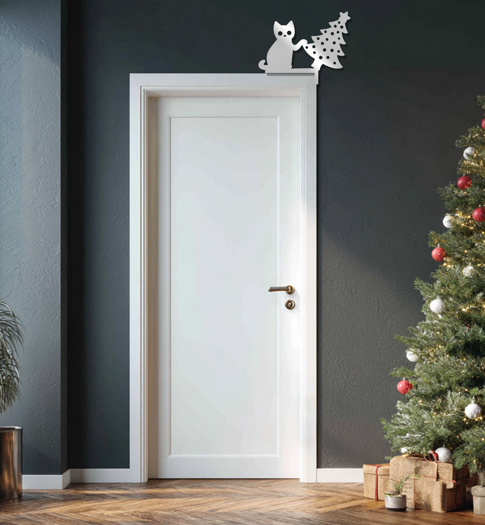 Holiday-themed cat and Christmas tree metal wall piece