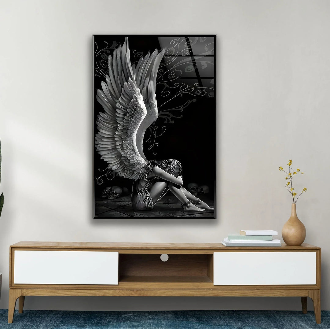Artistic grayscale angel image on tempered glass featuring detailed wings and a shadowy ambiance.