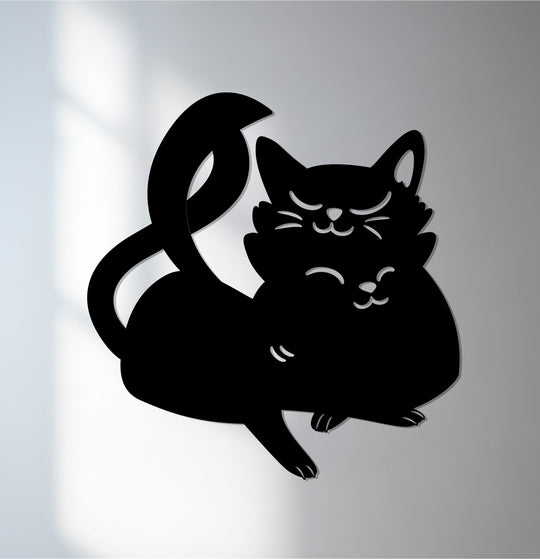 Subtle light and shadow accentuate the sleek lines of the cat silhouette, creating a unique metal wall art piece perfect for adding minimalist charm.