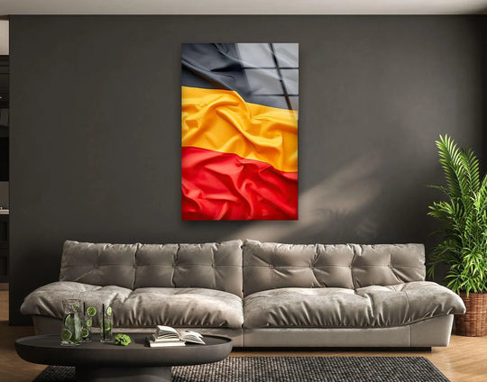 A layered German flag composed of black, gold, and red silk creates a unique modern wall decor effect.