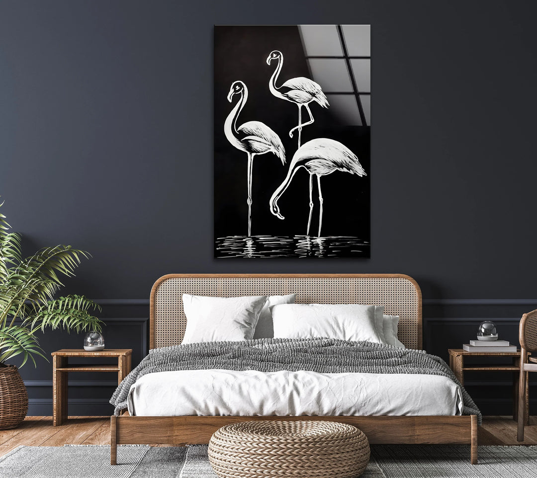 Stylish black and white flamingo trio artwork on glass with reflective water accents.