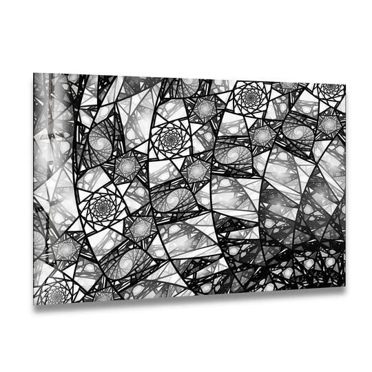 Intricate black and white fractal pattern printed on modern glass wall art.