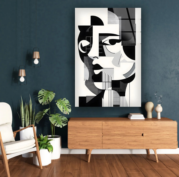 Artistic monochrome portrait on tempered glass featuring strong lines and cubist-inspired facial elements.