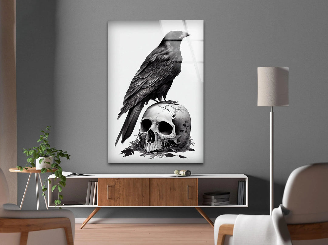 Black and white gothic decor piece showing a raven on a skull with realistic shading and eerie tone.
