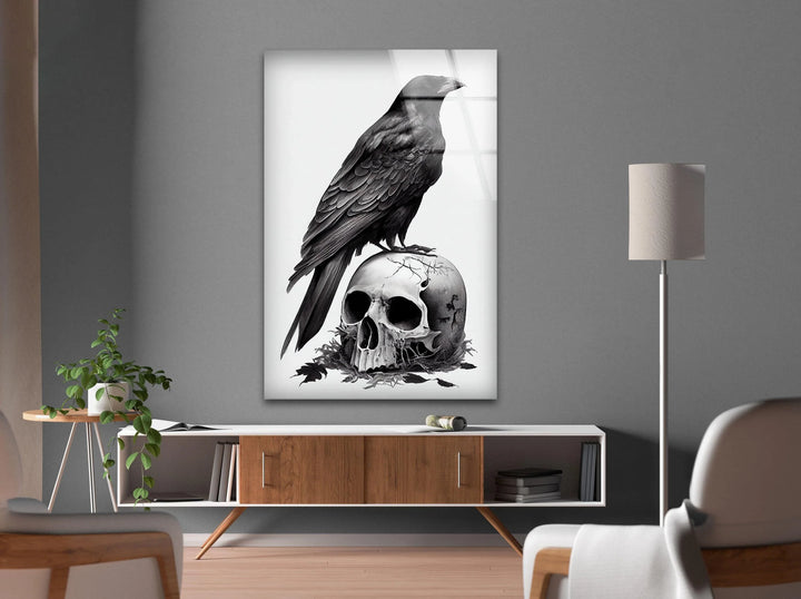 Black and white gothic decor piece showing a raven on a skull with realistic shading and eerie tone.