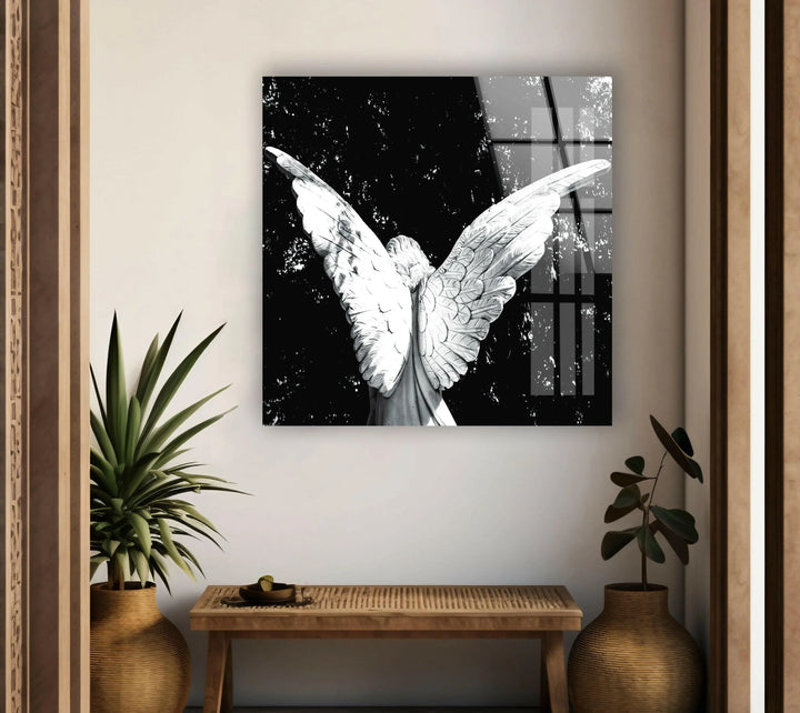 Black and white angel wings artwork printed on glass showcasing intricate feather details.