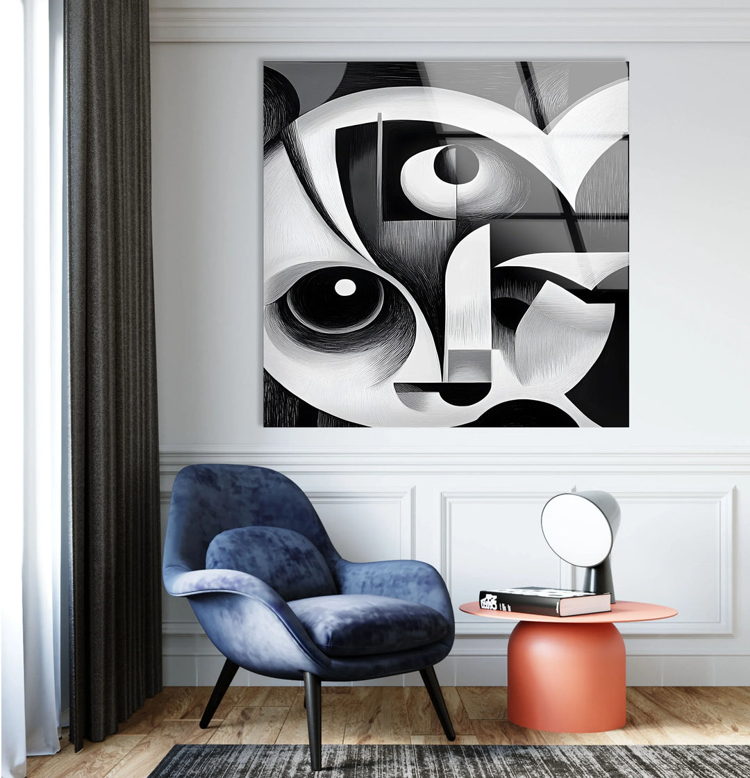Black and white geometric artwork on glass highlighting distorted facial features and abstract curves.