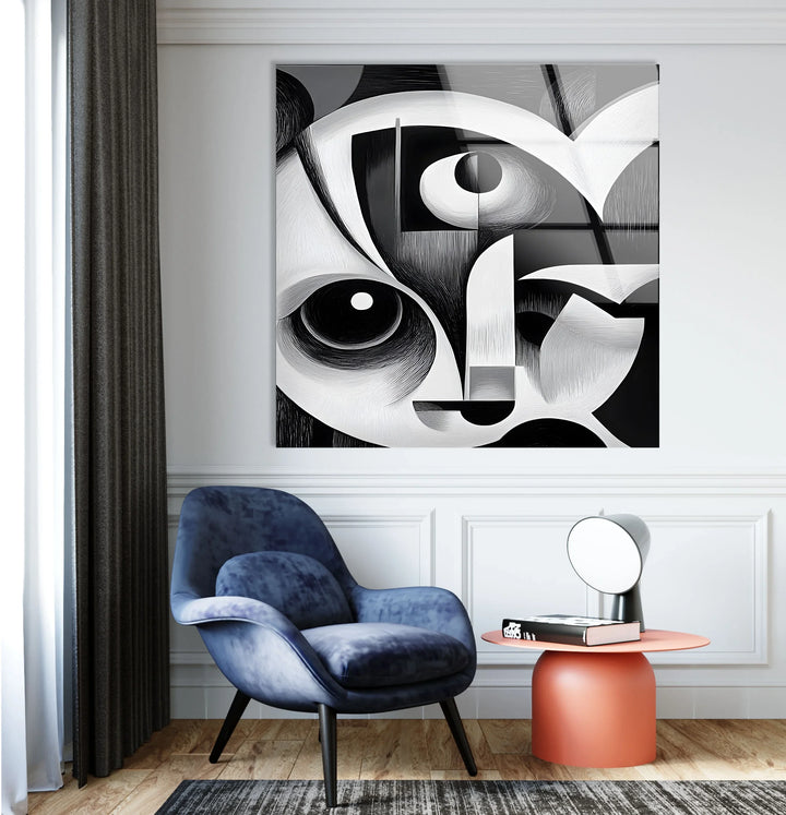 Black and white geometric artwork on glass highlighting distorted facial features and abstract curves.