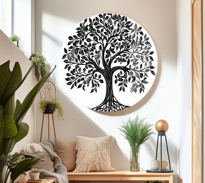 Grayscale decorative tree design on glass with symmetrical branches and elegant leaf patterns.