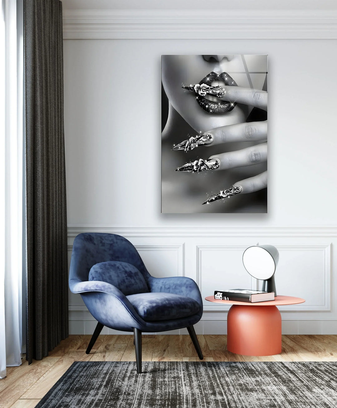 Glass wall art highlighting an elegant close-up of shimmering lips paired with intricate nail embellishments.