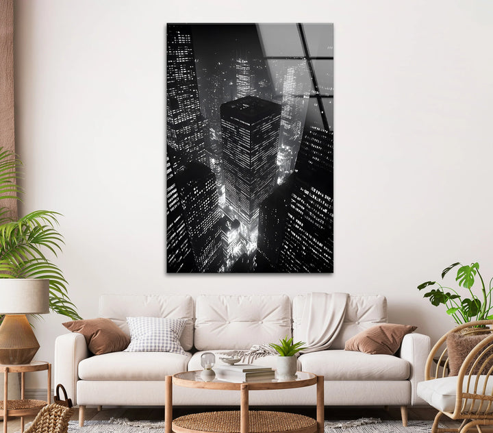 Dramatic nighttime skyline art with glowing high-rise buildings in black and white.