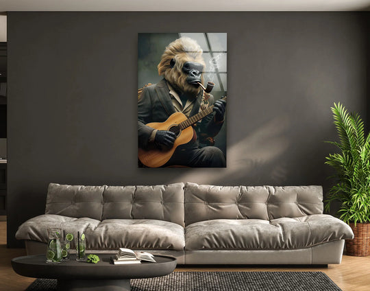 Dark shadows define the textured sofa and coffee table beneath the art from glass depiction of a smoking, guitar-playing gorilla.