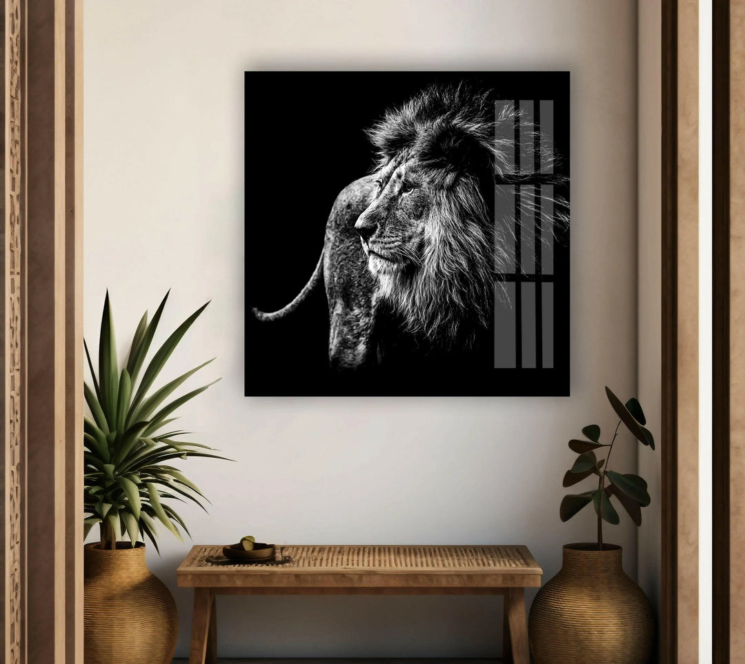 Glass panel art depicting a regal lion standing in dramatic black and white contrast.