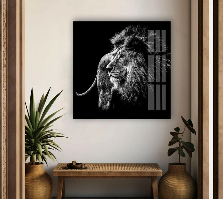 Glass panel art depicting a regal lion standing in dramatic black and white contrast.