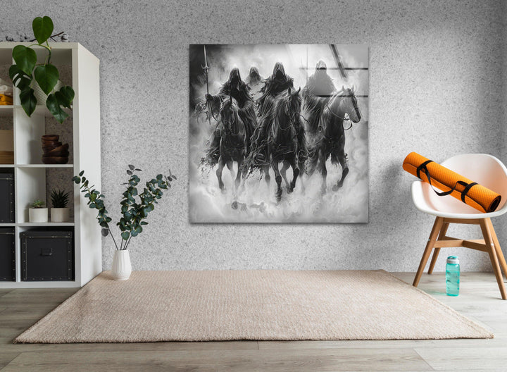 Intense monochrome wall decor showing hooded horsemen riding forward in a mist-filled landscape.