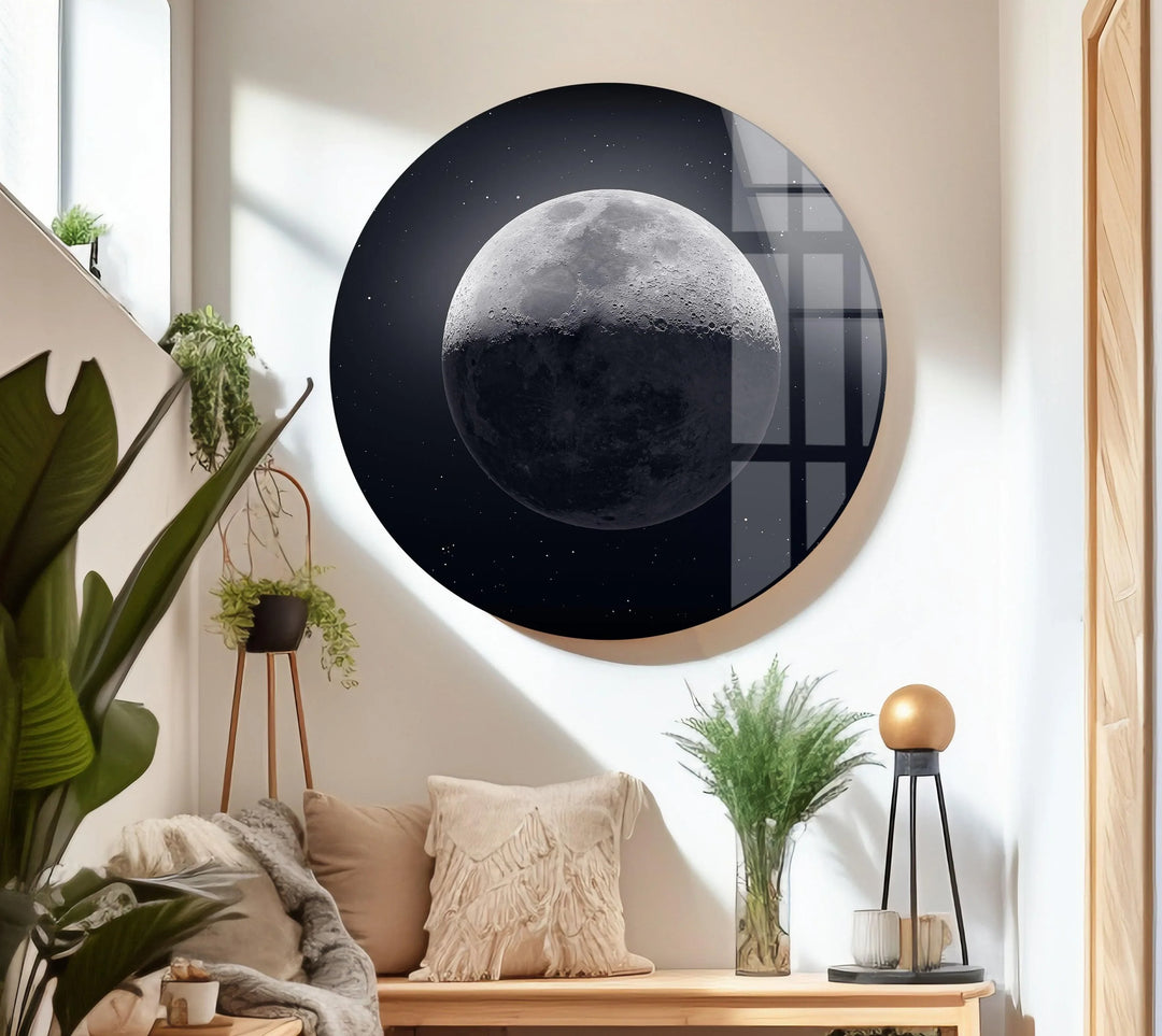 Detailed lunar surface with soft glow surrounded by stars on modern glass décor.