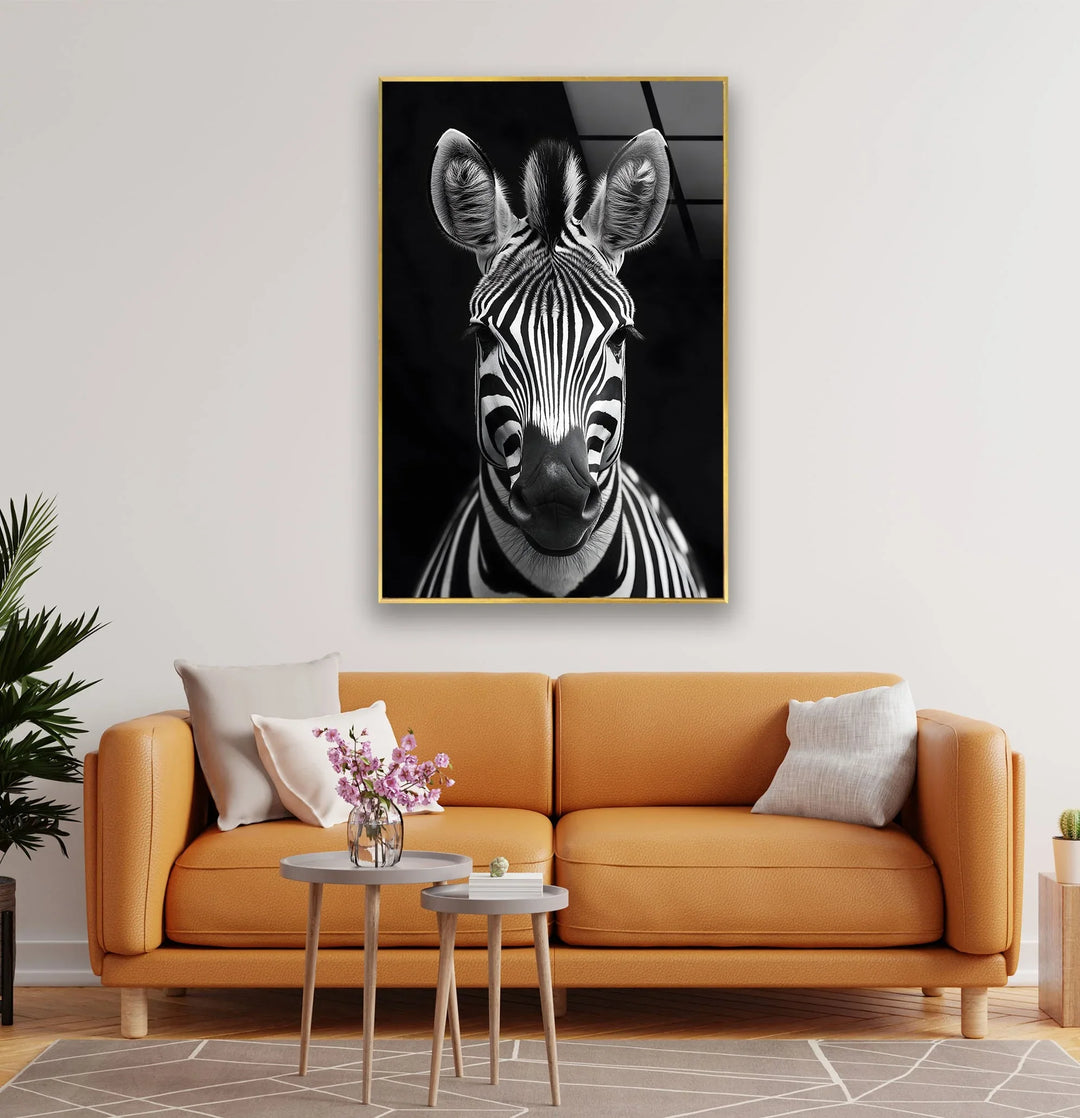Grayscale zebra close-up on tempered glass emphasizing the intricate facial stripe pattern.