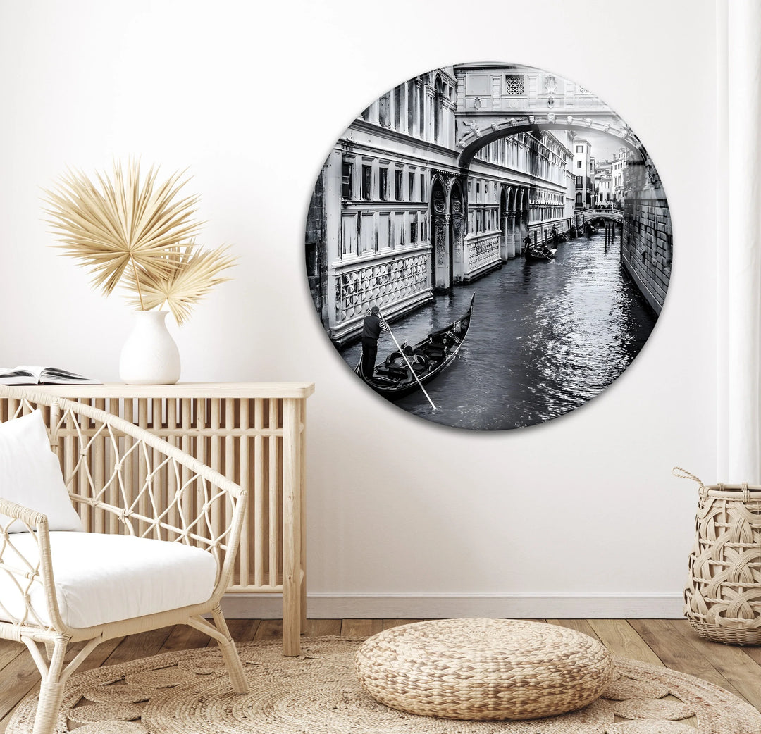Timeless black and white glass wall art of Venetian architecture and gondola reflections.