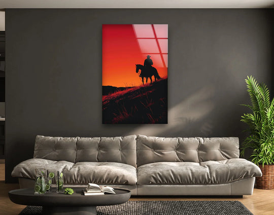 Vertical rectangular glass wall art showing a western rider silhouette exemplifies unique modern wall decor with its sleek, desert-themed design at sunset.