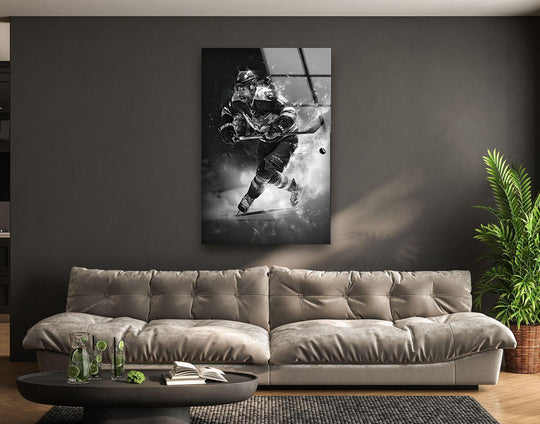 Black and white hockey player speeding across ice in dramatic glass wall art.