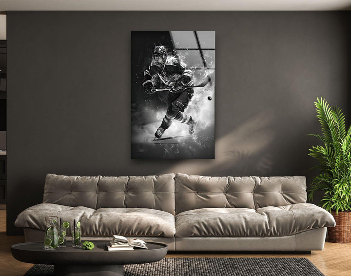 Black and white hockey player speeding across ice in dramatic glass wall art.