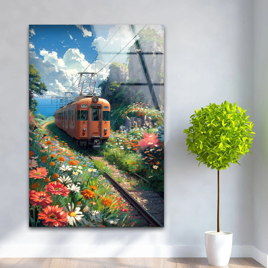 A vibrant orange train winds through a field of blooming flowers, showcasing organic forms in home decoration.