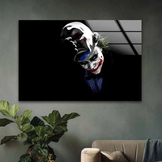 Gnarled organic forms shape a darkly theatrical clown mask in this dual face minimalist glass printing wall art, creating dramatic shadows.