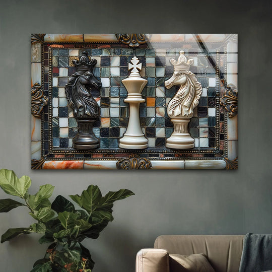 Abstract mosaic squares form a dynamic backdrop for the regal chess pieces in this striking glass wall art decor.