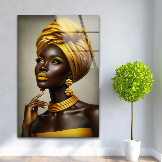 Vibrant yellow tones of this African woman glass wall art create a striking color contrast against the neutral background, showcased as best glass art.