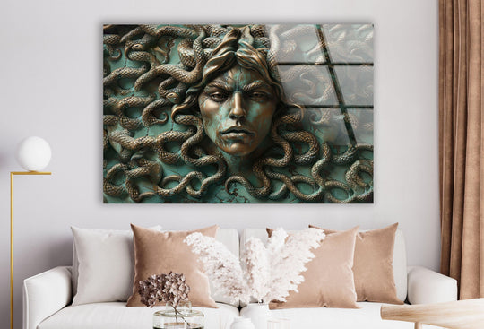 A captivating glass art painting features the organic forms of Medusa's serpentine hair, rendered with intricate detail and verdigris patina.