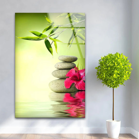 Zen spa stones and bamboo leaves cast soft shadows on tranquil waters in this calming print wall art.