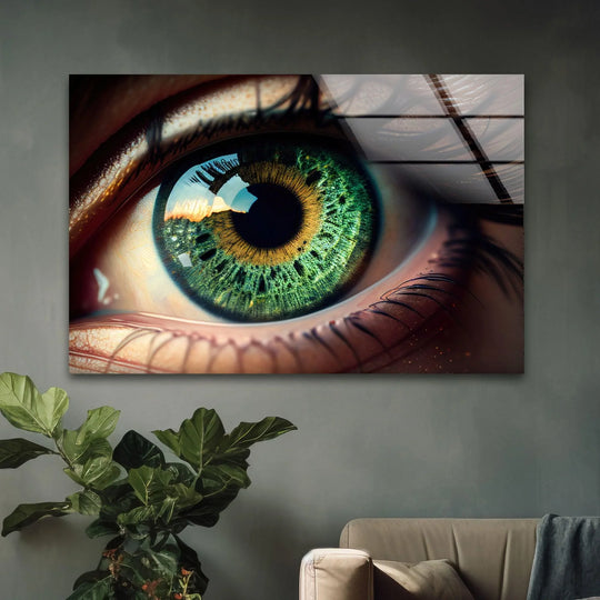 Vivid green eye art contrasts with warm skin tones and reflective elements, creating stunning decorative wall art.