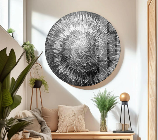 A captivating circular abstract glass art piece with a radiating, textured silver pattern that draws the eye.