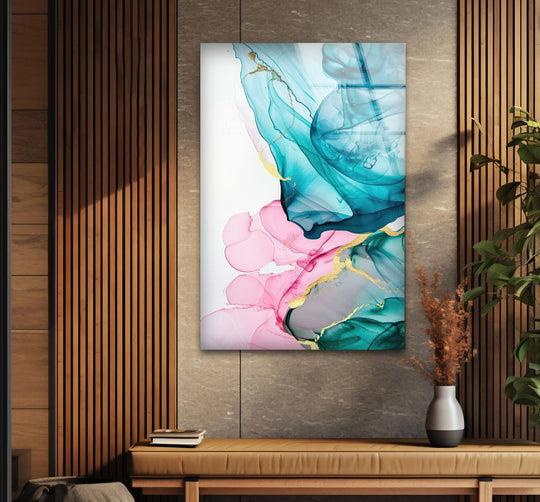 Turquoise swirls and pink abstract forms illuminated by the brightest area of this glass printing enhance a modern design.