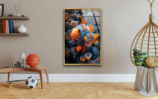 Minimalist negative space surrounds vibrant glass wall art of a brightly colored clownfish.