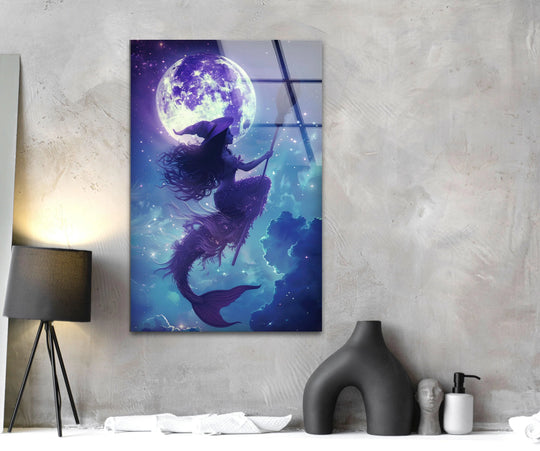 Dominant in deep blues and vibrant purples, this mermaid glass wall art decor features a mystical scene.