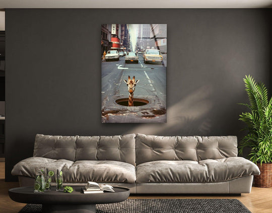 A giraffe emerges from a circular sewer opening in this unique glass wall art decor, set against a city street with geometric buildings.
