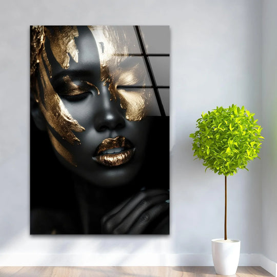 Stunning black woman glass wall art showcases a dramatic transition from deep black to shimmering gold accents, perfect for elegant home decor.