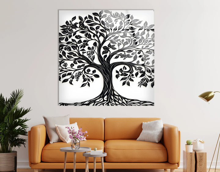 Monochrome ornamental tree artwork on glass featuring elaborate branching and leaf clusters.