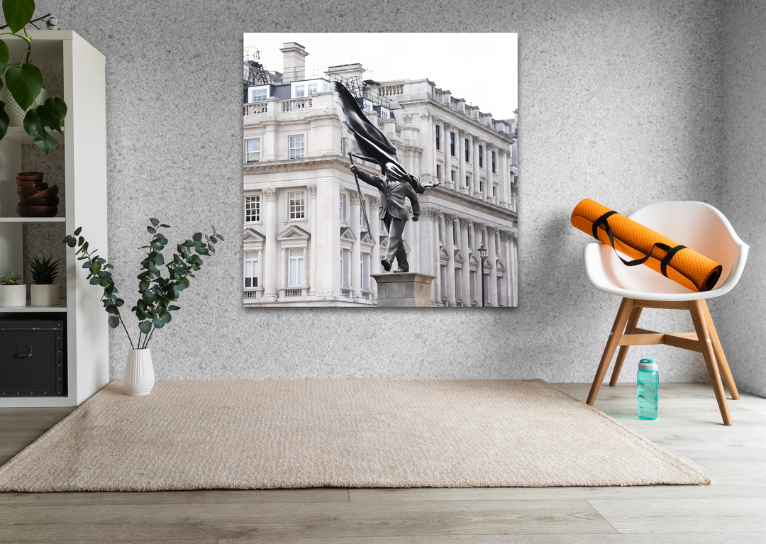 Clean negative space beautifully frames a captivating Banksy statue in London glass art painting, emphasizing its urban elegance.