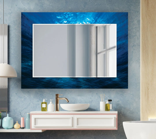 Dominant dark blue hues define this large wall mirror for wall decor, creating a calming ocean-inspired home decor accent.