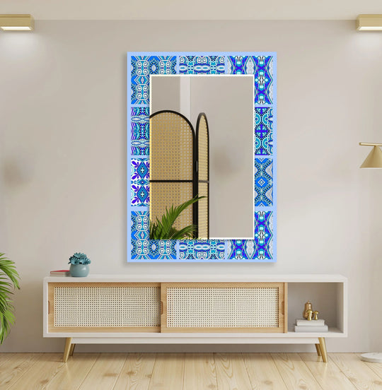 Highlighting the layering effect, this modern wall mirrors image showcases an ethnic blue mosaic design with a unique frame enhancing the depth of the central mirror.