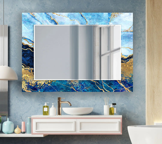 Dominant light blue and navy hues accentuate this wall mirror, making it a stylish bathroom mirror and elegant decor with gold accents that captures attention.