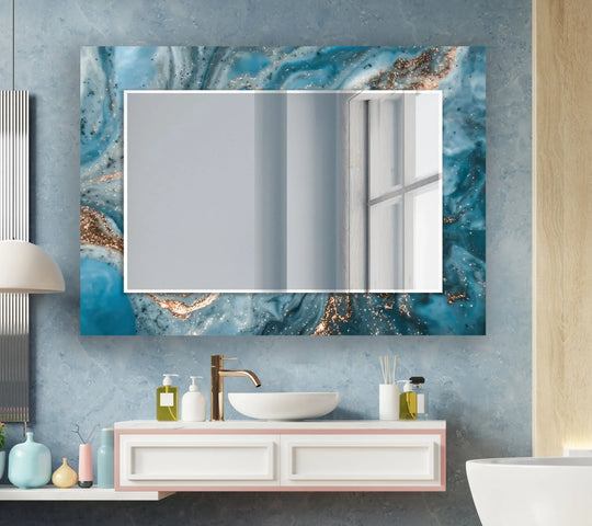 Featuring a rectangular design, this blue sea wall mirror for wall decor includes bronze details set against repeating geometric shapes in the mirror frame.