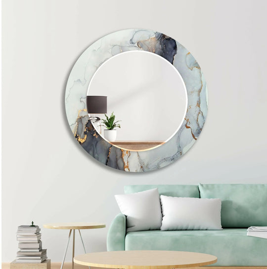White and golden marble decorative wall mirror round with abstract white grey and gold colors reflecting a room on a white wall