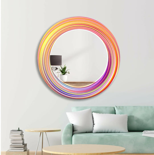 Round mirror with an orange circle design and vibrant abstract colorful swirling frame showcasing yellow pink and purple hues