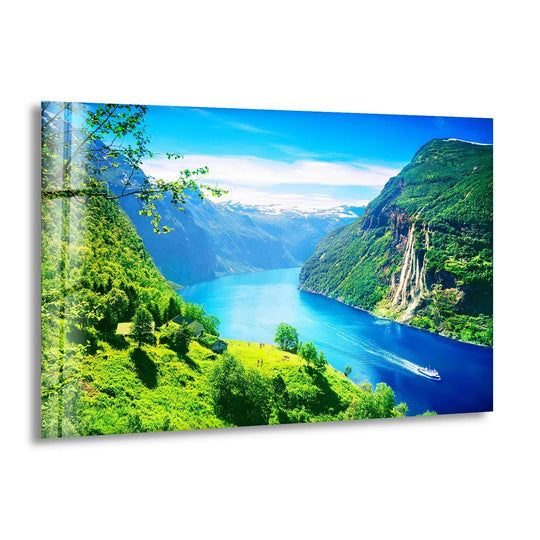 Dramatic color contrast highlights the Geirangerfjord Norway glass art painting, where vivid green slopes meet the deep sapphire fjord beneath a clear azure sky.